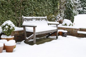 Garden patio bench with snow